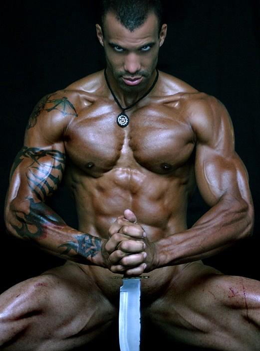 Muscle Man Holding Knife